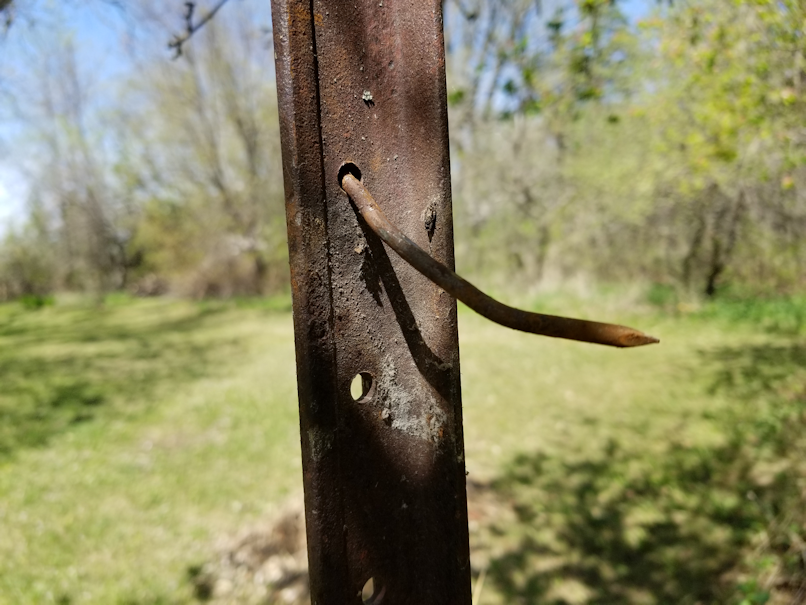 20180521.flower.garden.side.fence.corner.post.nail