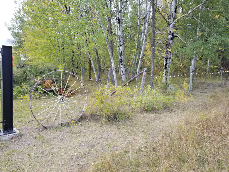 20180919.cleanup.sprucegrove.fenceline.1.at.gate.after.a